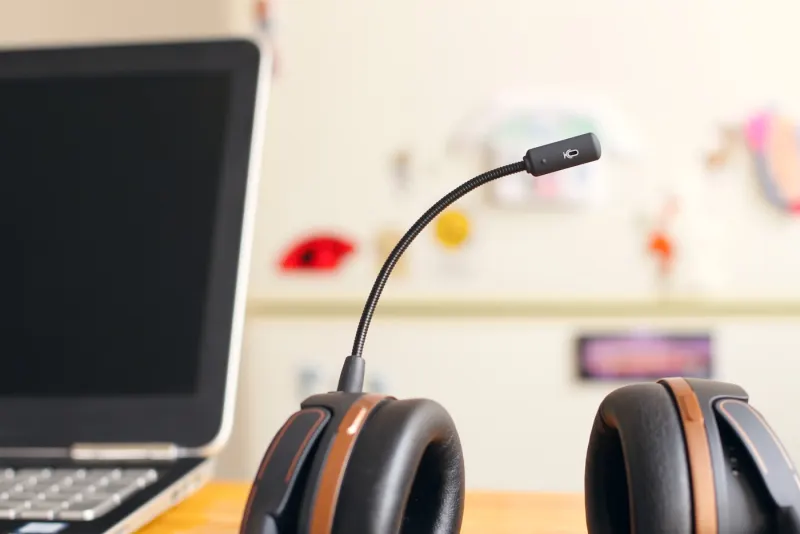 A friendly customer support specialist wearing a headset